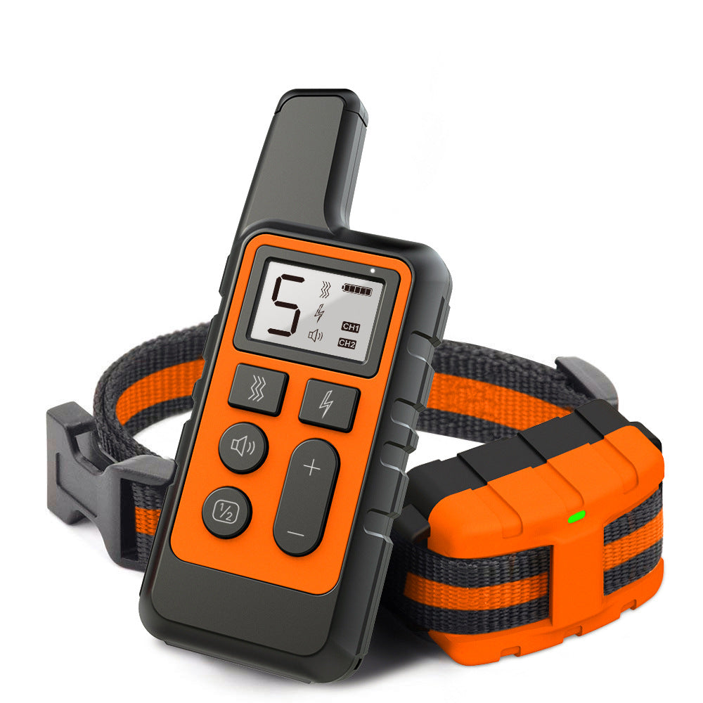 Orange and black electronic dog training collar with remote control on a white background