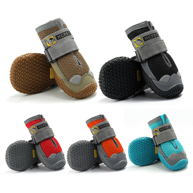 Set of colorful pet boots with gray straps on a white background