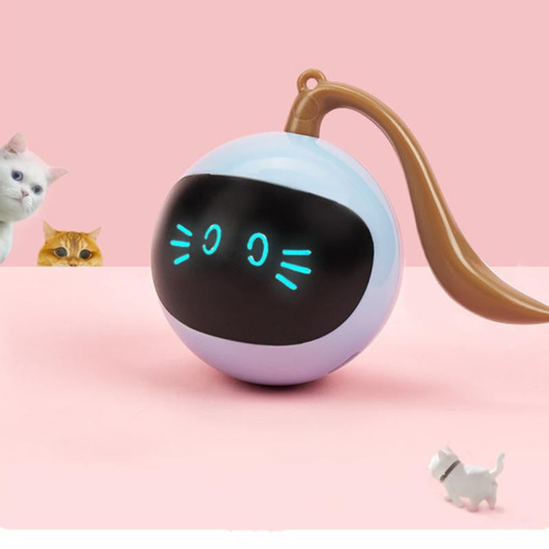 Toy resembling a cat with a round head and tail on a pink background