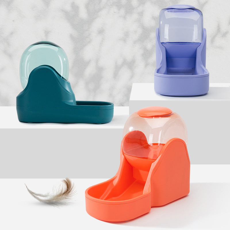 Four colorful pet feeders on a light gray background