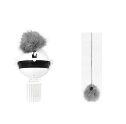 Decorative hanging item with gray pom-poms on a white background