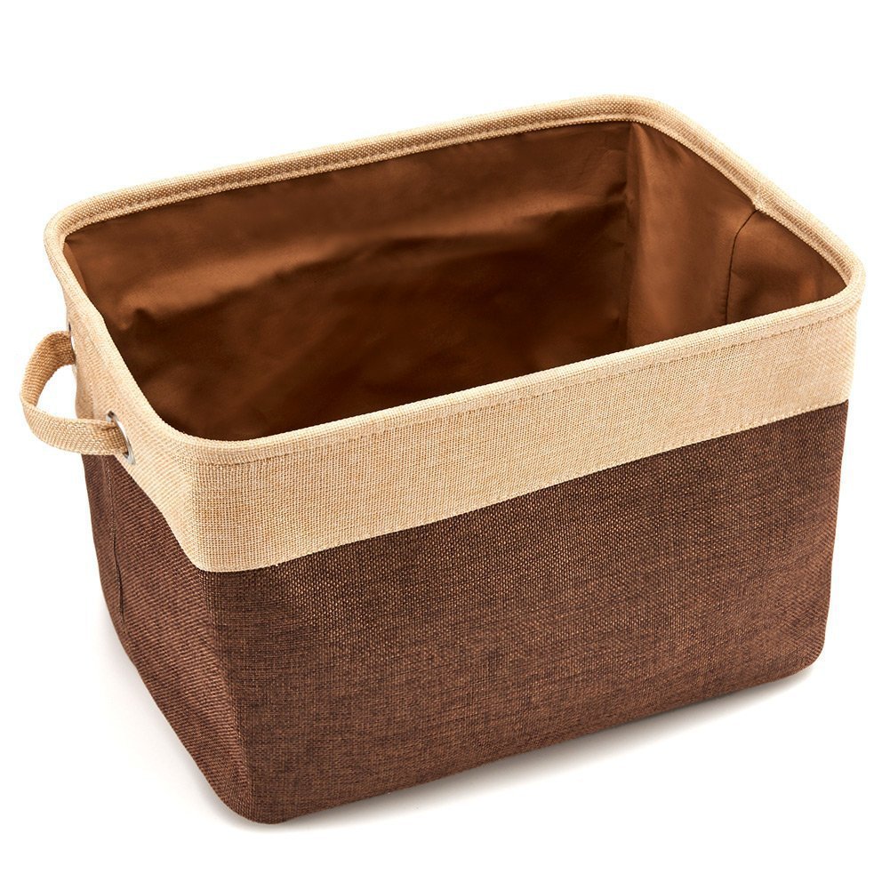 Brown storage basket with beige interior on a white background