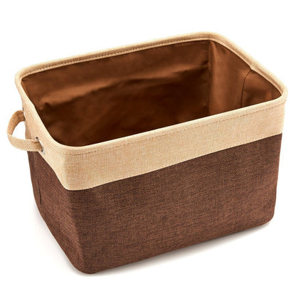 Brown storage basket with beige interior on a white background