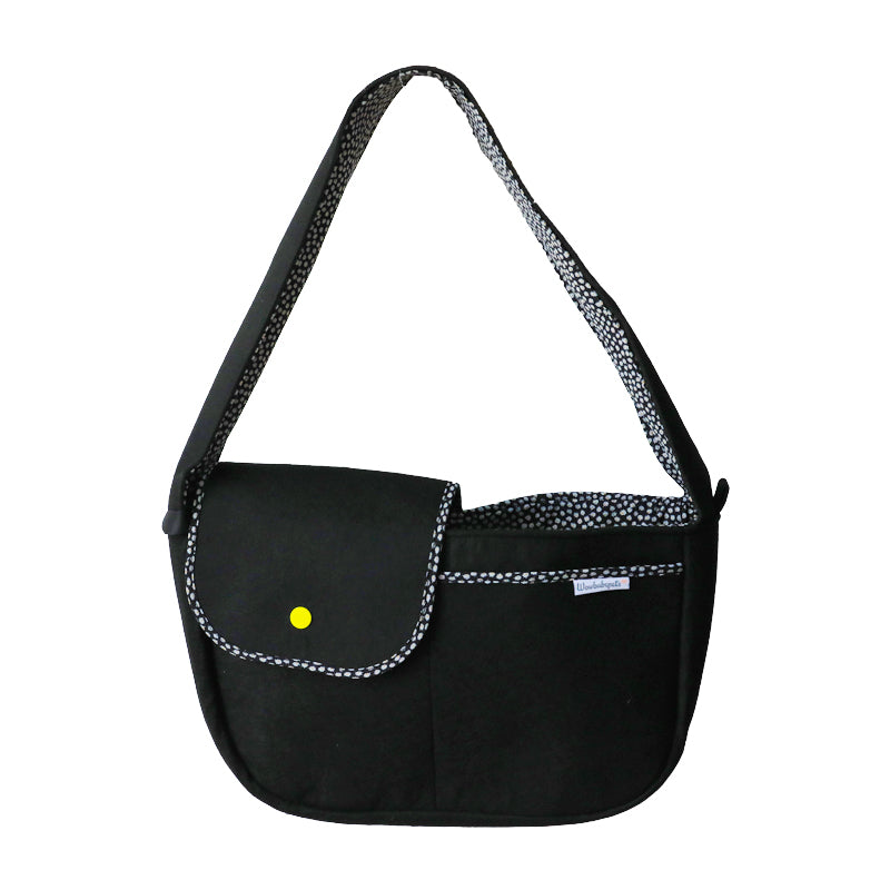 Black bag with a yellow button on a white background