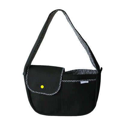 Black bag with a yellow button on a white background