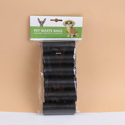 Pack of pet waste bags with a clear plastic cover on a beige background