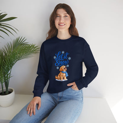 A woman wearing a navy blue crewneck sweatshirt with a graphic of a golden retriever dog in a winter outfit and the text 'Let it Snow' in blue.  