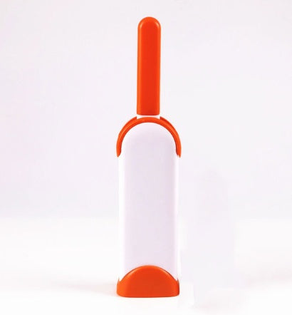 White and orange cleaning tool on a white background