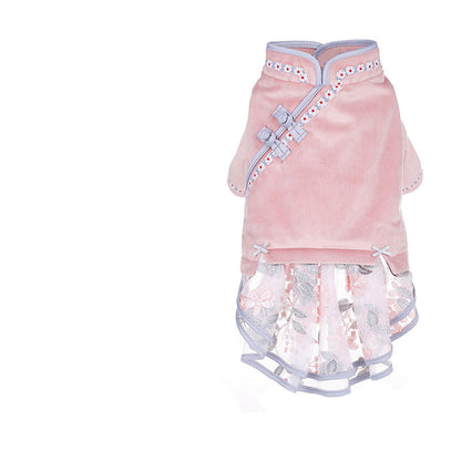 Pink pet dress with floral design on a white background