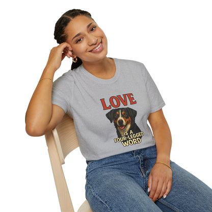 Person wearing a gray t-shirt with a dog graphic and text, sitting on a chair.