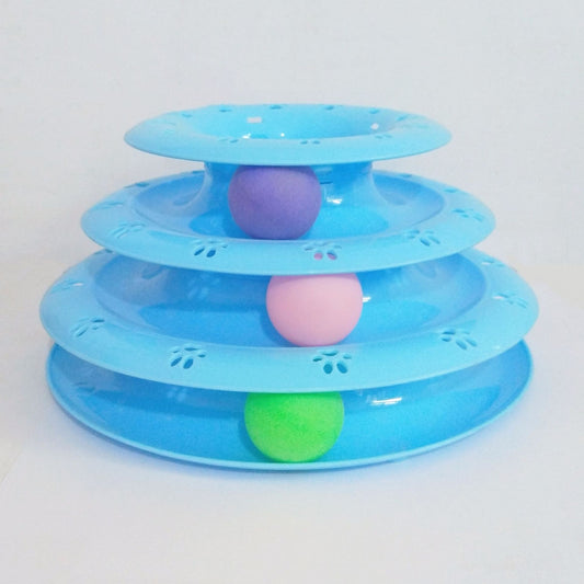 Three-tiered blue pet toy with colorful balls on a white background
