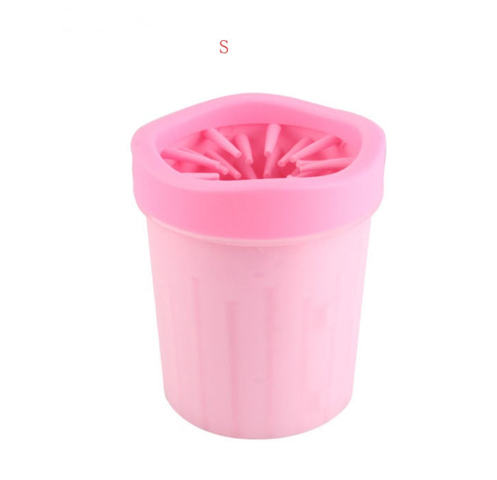 Pink silicone cup with small holes on a white background