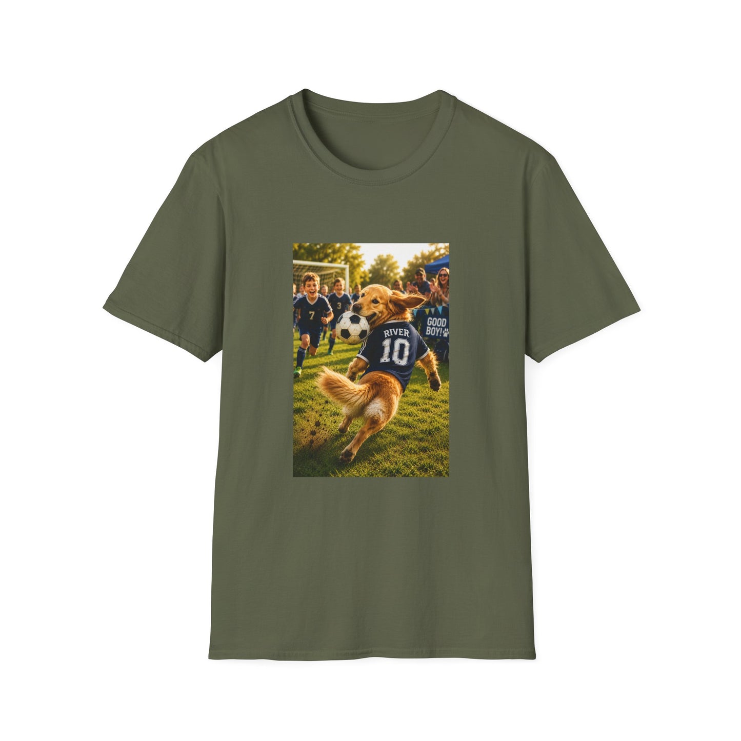 An olive green short-sleeve crewneck t-shirt featuring a rectangular graphic print on the front. The graphic depicts a golden retriever dog wearing a navy blue soccer jersey with the number 10, running with a soccer ball on a grassy field.