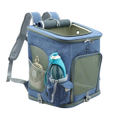 Blue pet carrier backpack with a water bottle holder on a white background
