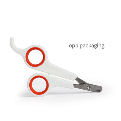 White and red pet nail clippers on a white background with 'opp packaging' text.