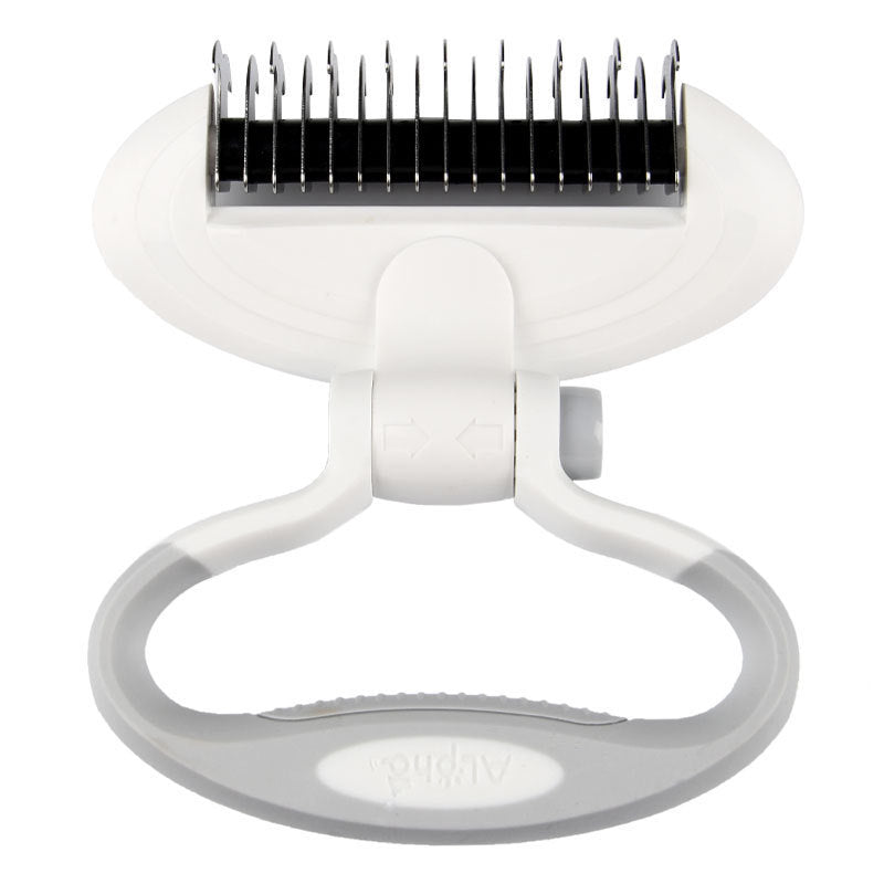 White grooming tool with black attachments on a white background