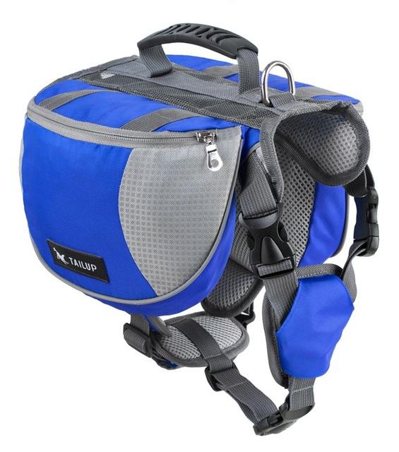 Blue and gray dog backpack with harness on a white background