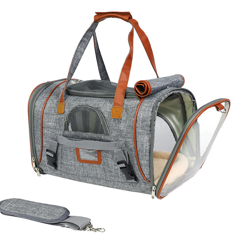 Gray pet carrier with brown accents on a white background