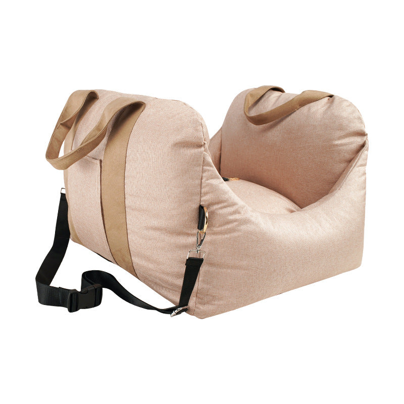 Beige pet carrier with straps on a white background