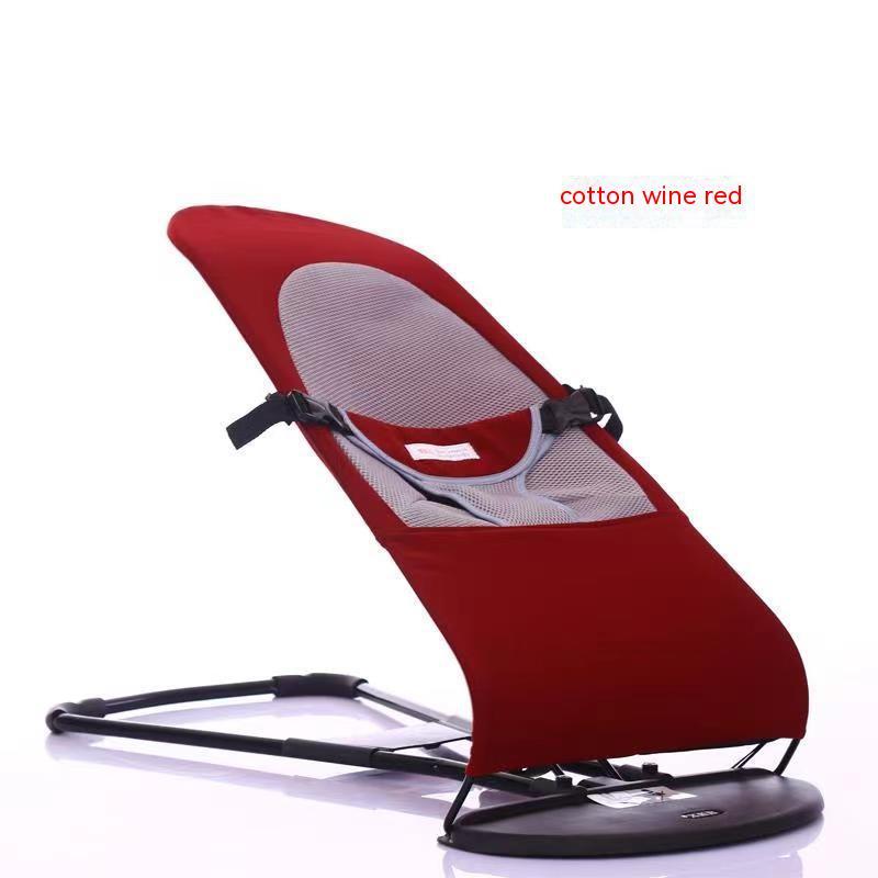 Red baby bouncer with black base on a white background