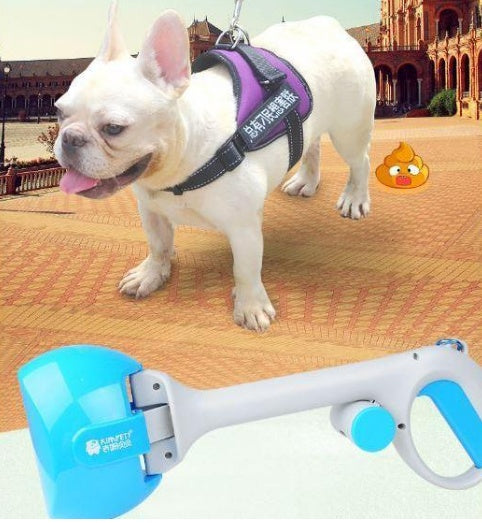 White dog wearing a purple harness with a blue and gray pet waste picker on a white background