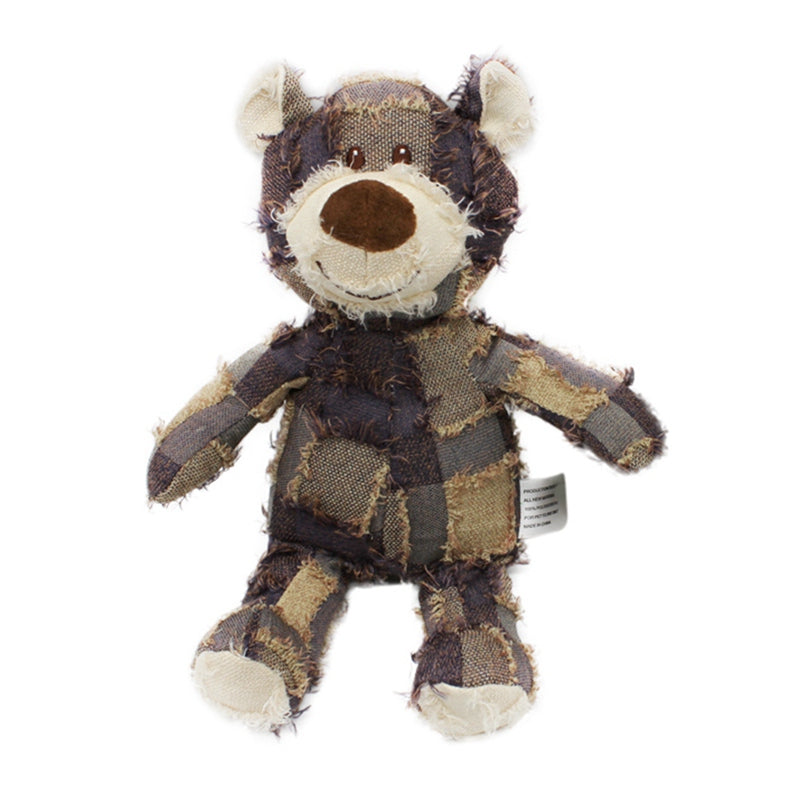 Plush toy wolf with checkered pattern on a white background
