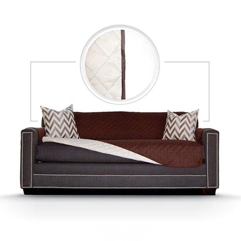 Brown and gray sofa with patterned cushions on a white background