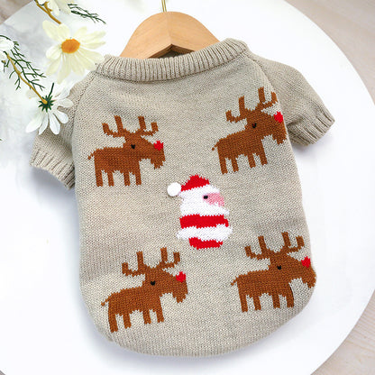 Dog sweater with reindeer and Santa Claus design on a white background