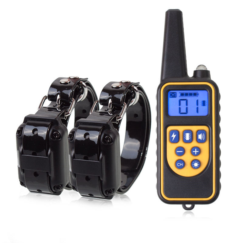 Two black dog collars with a yellow and black remote control on a white background