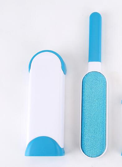 Blue and white pet grooming tool on a white background