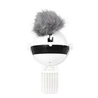 Silver bell with a gray fur pom-pom on a white background