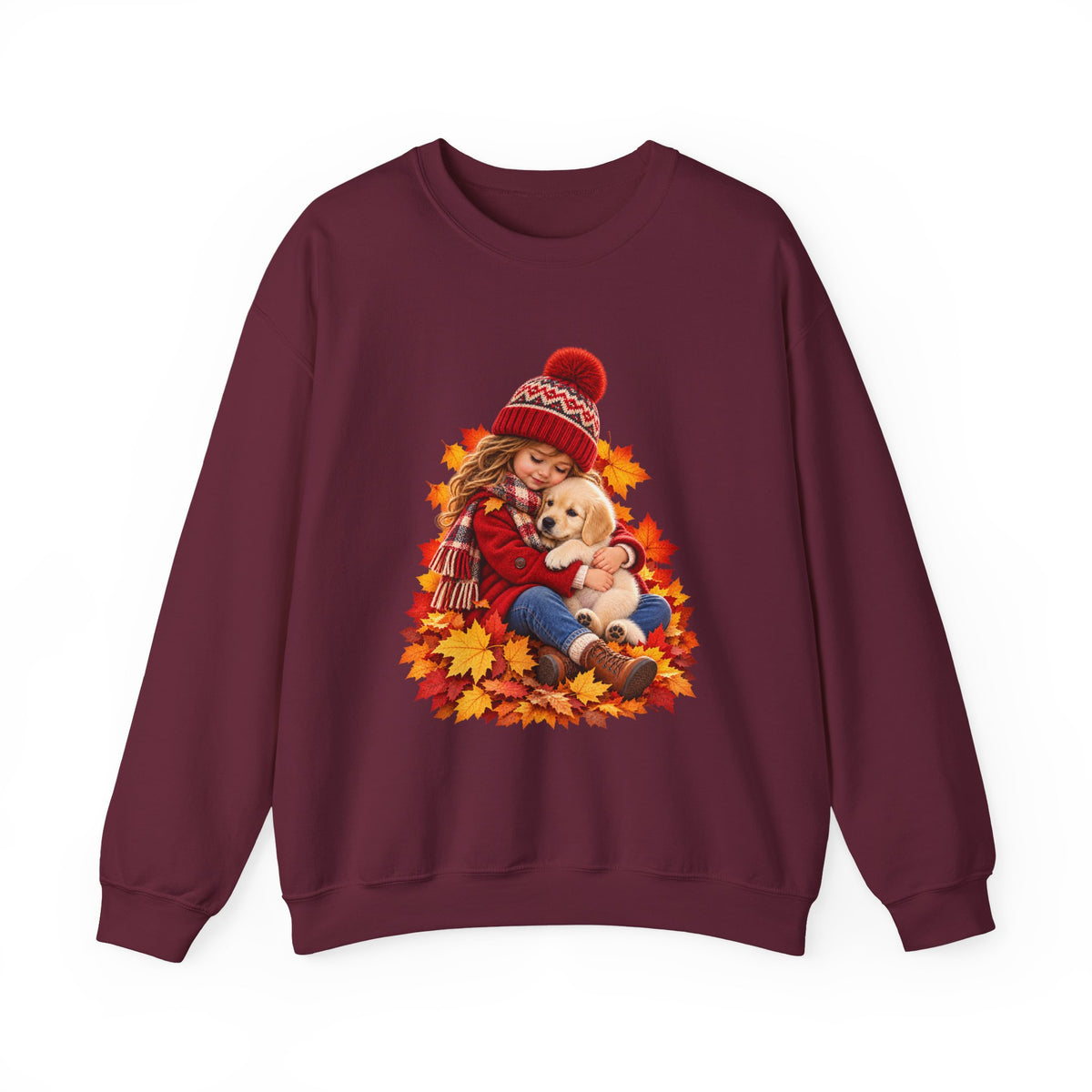 Maroon crewneck sweatshirt featuring a little girl cuddling a golden retriever puppy among autumn leaves