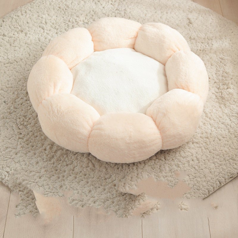 Round, plush pet bed on a soft rug