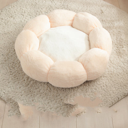 Round, plush pet bed on a soft rug