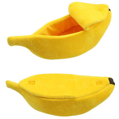 Two yellow banana-shaped slippers on a white background