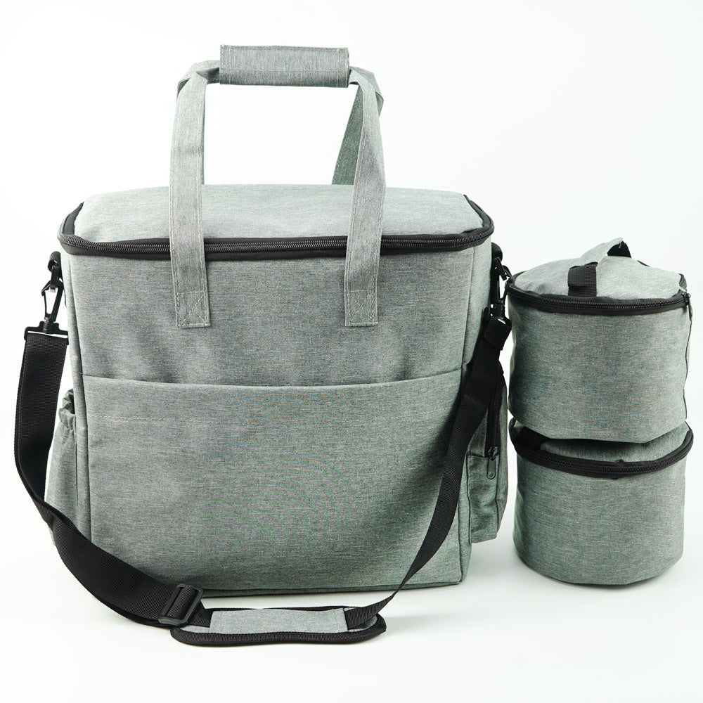 Gray cooler bag with detachable containers on a white background