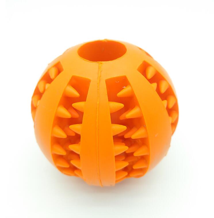 Orange textured ball on a white background