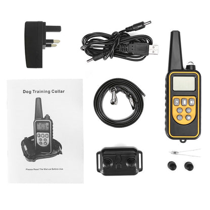 Dog training collar with accessories on a white background