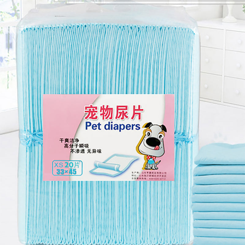 Stack of blue pet diapers with a pink label featuring a cartoon dog and text.