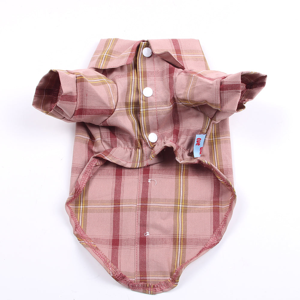Plaid dog shirt with buttons on a white background