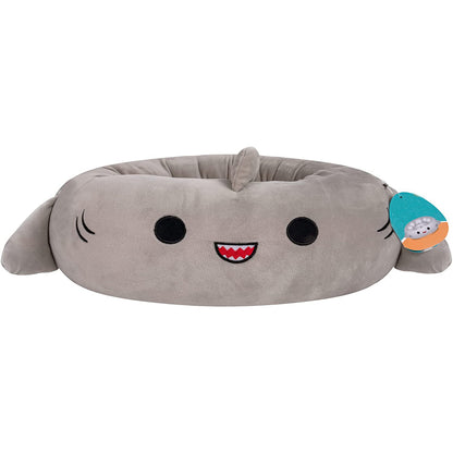 Plush shark-shaped pet bed with a smiley face on a white background