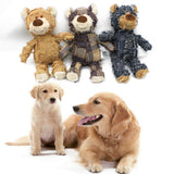 Three plush dog toys resembling bears and a dog sitting next to them on a white background