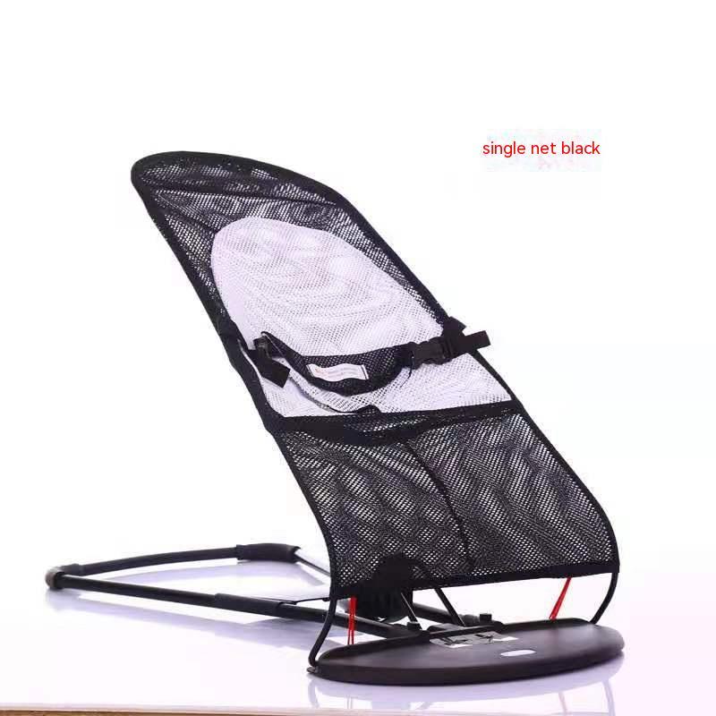 Black baby bouncer with white cushion on a white background