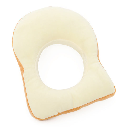 White bread-shaped pillow on a white background