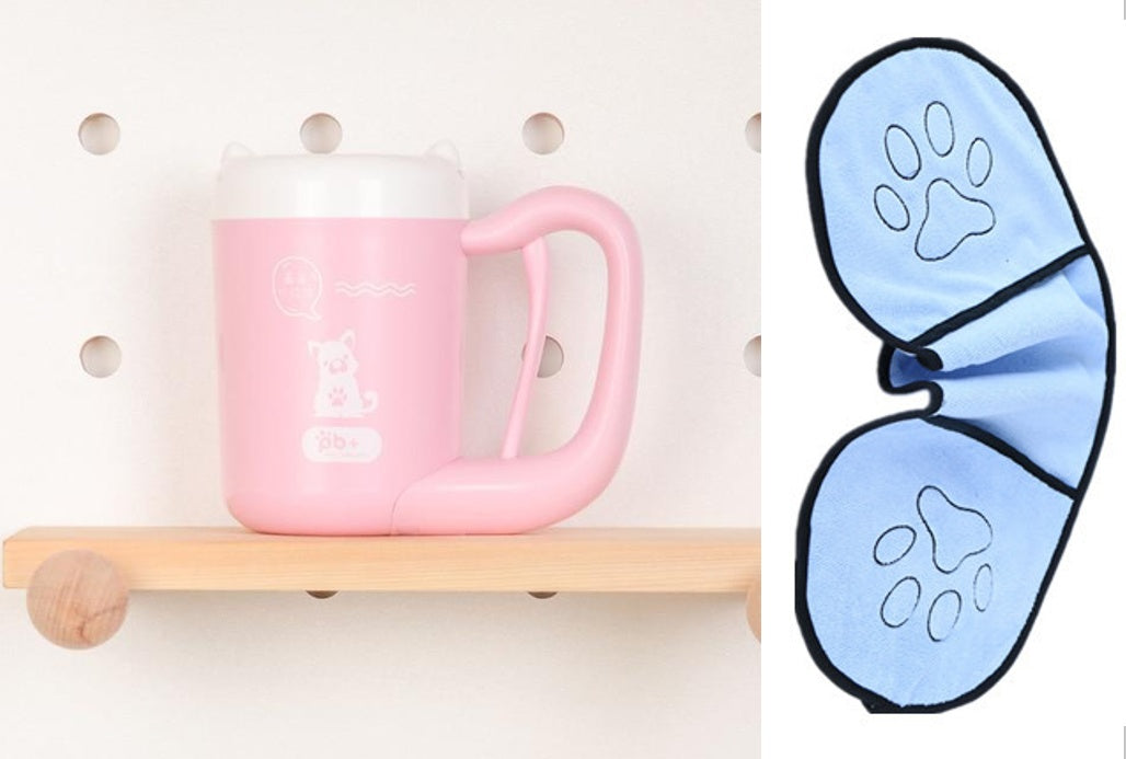 Pink mug on a wooden shelf with a blue paw print item next to it.
