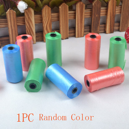 Colorful spools of thread on a white surface with a wooden fence background
