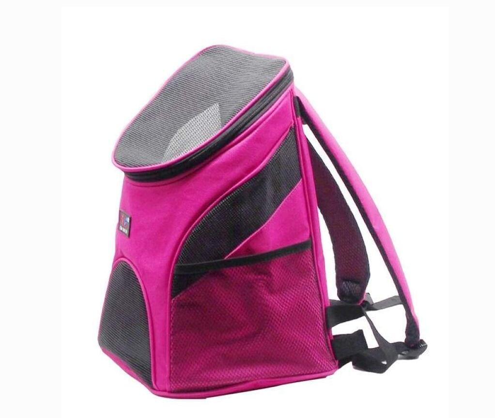Pink pet carrier backpack with gray top on a white background