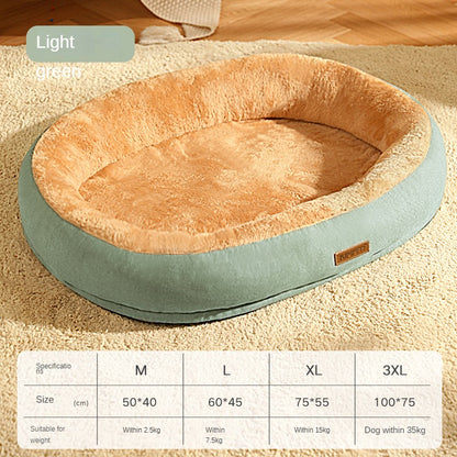 Pet bed with light green exterior and brown interior on a carpeted floor.