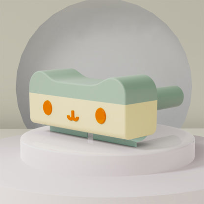 Cute, cartoonish robot toy with a light green head and body on a neutral background