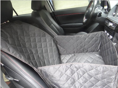 Gray quilted car seat cover inside a vehicle